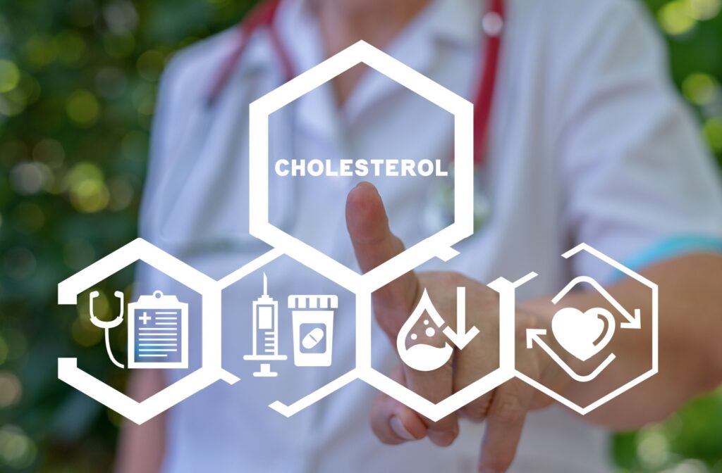 A doctor using a virtual touch interface, pressing the word: CHOLESTEROL