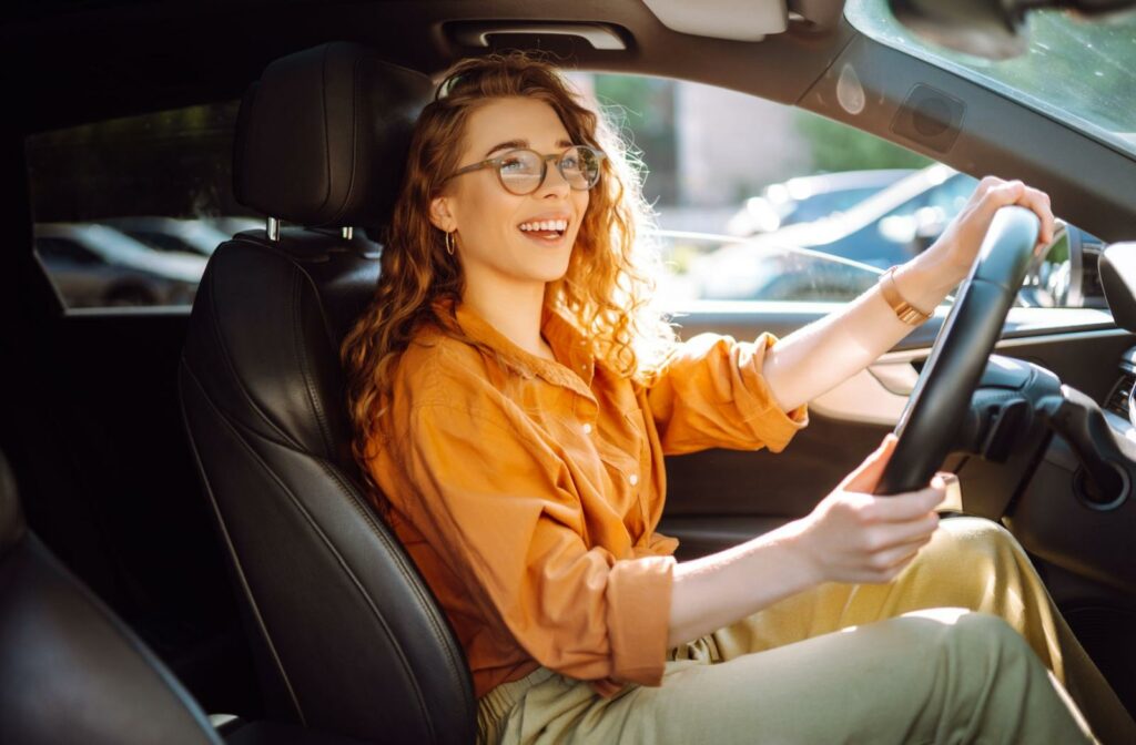 A person driving a car.